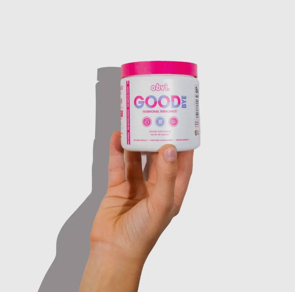 Hand holding Obvi Good Bye Hormonal Balance