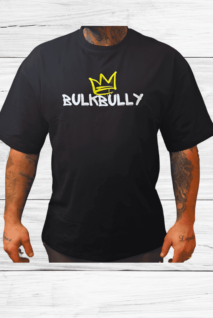 Mens Black Oversized Tee from BulkBullys G.O.A.L.S Collection featuring bold BULKBULLY logo with yellow crown on front. Relaxed fit for streetwear style.