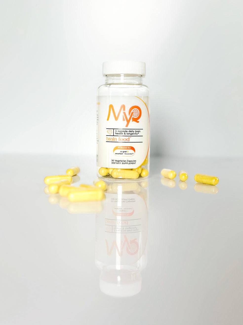 MYQ Brain Food vitamins bottle with scattered capsules