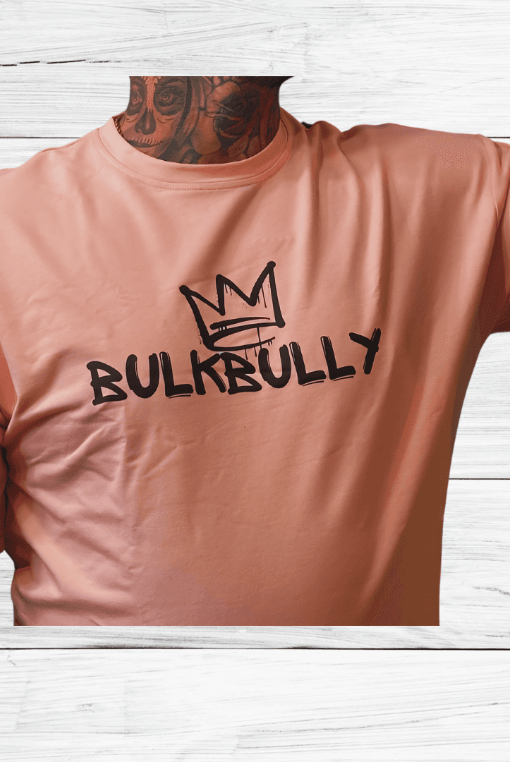 Mens Oversized Tee from BulkBully's G.O.A.L.S Collection in pink with bold BULKBULLY crown logo on chest. Ideal for streetwear fashion.