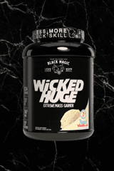 Black Magic Mass Gainer in vanilla flavor with 1200 calories and 54g protein per serving, ideal for muscle gain and bulking nutrition.