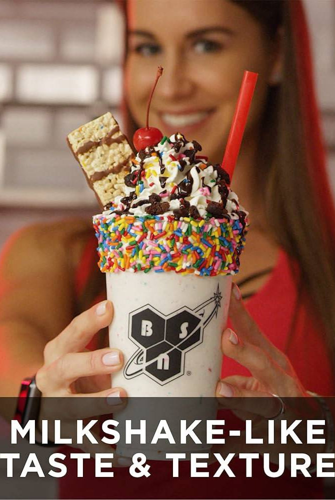 Woman holding a BSN SYNTHA-6 protein milkshake with sprinkles and whipped cream, highlighting its milkshake-like taste and texture.