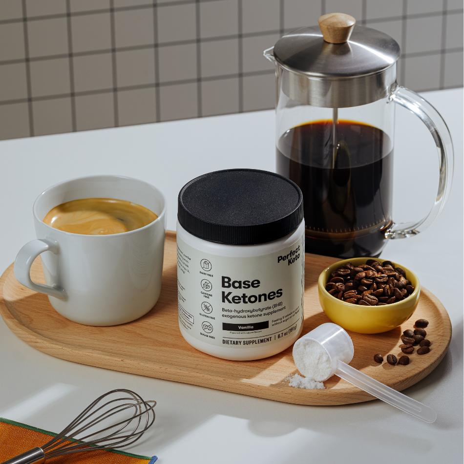 Vanilla Perfect Keto Base Ketones with coffee setup, caffeine-free BHB supplement for clean energy and mental clarity support.
