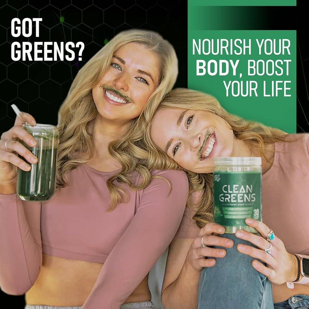 Two women enjoying VNDL Clean Greens drink, promoting body nourishment and energy boost with superfood-rich greens supplement.