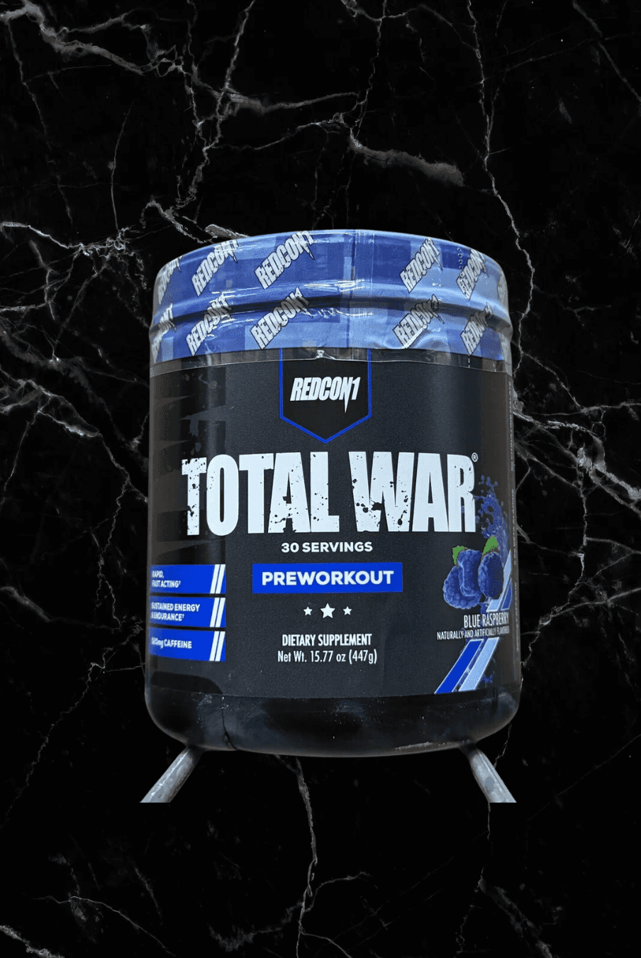 Redcon1 Total War Pre-Workout in Blue Raspberry flavor. High-stimulant formula with 320mg caffeine and 3.2g beta-alanine per serving.