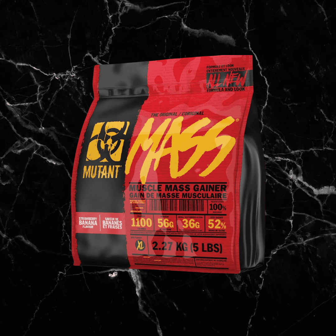 Mutant Mass Gainer Banana Strawberry flavor, 2.27kg pack offering 1,100 calories and 56g protein per serving for serious mass building.