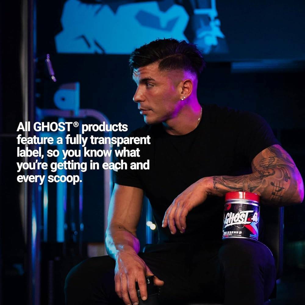 Man seated in gym holding Ghost Legend All Out Pre Workout. Emphasizes fully transparent label for ingredient clarity and trust in fitness supplements.
