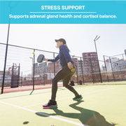 Woman playing paddle tennis with text promoting AdrenalCORE's adrenal gland health and cortisol balance for stress support.