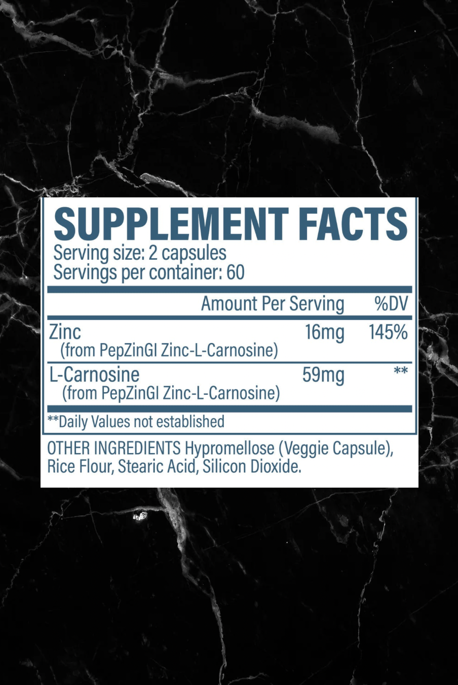 Supplement facts label for Revive Zinc Carnosine showing 16mg of Zinc and 59mg of L-Carnosine per serving with additional ingredients listed.