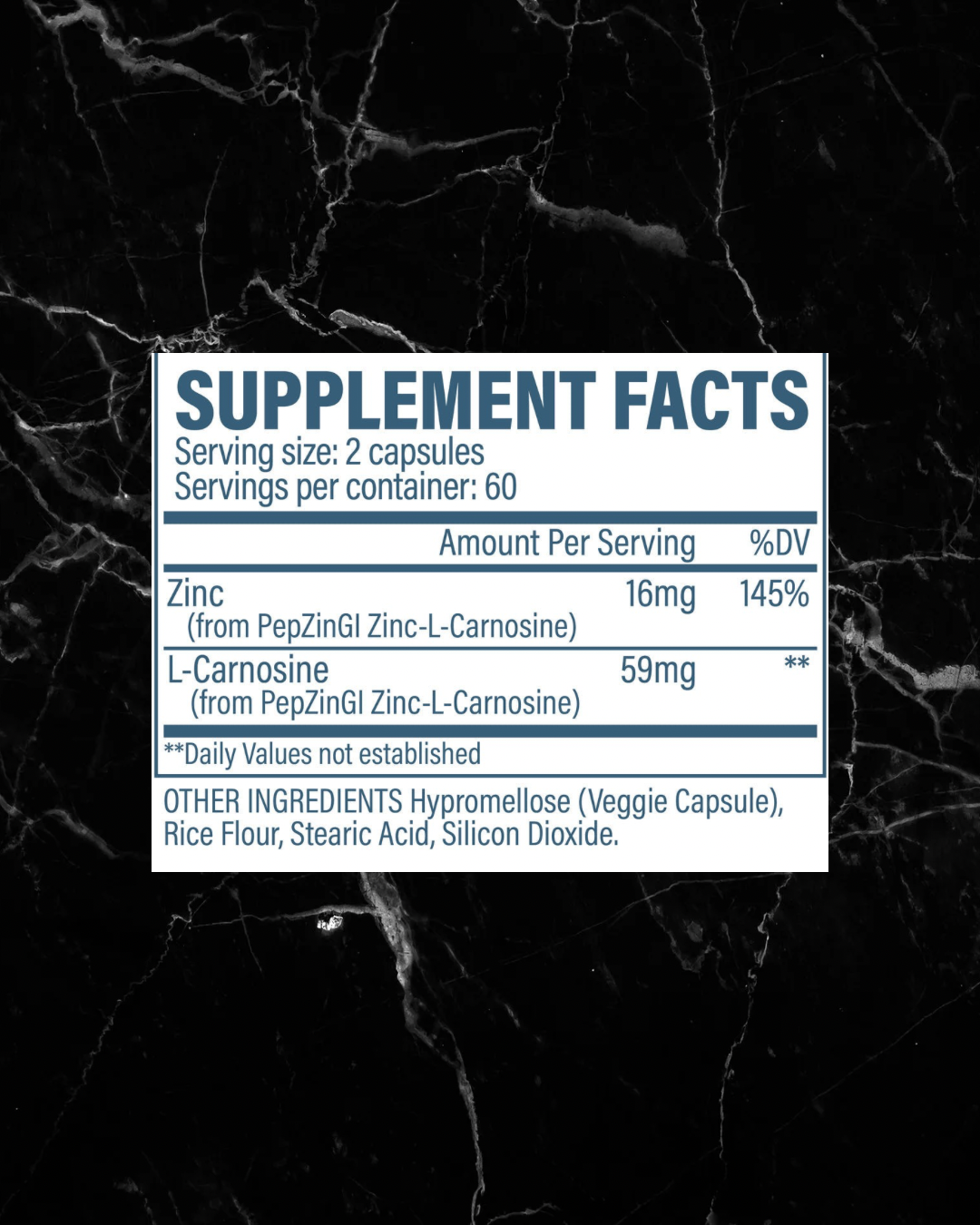 Supplement facts label for Revive Zinc Carnosine showing 16mg of Zinc and 59mg of L-Carnosine per serving with additional ingredients listed.