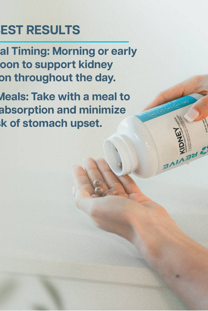Hand pouring Revive Kidney capsules from bottle. Best taken with meals in the morning or early afternoon for enhanced kidney function support.