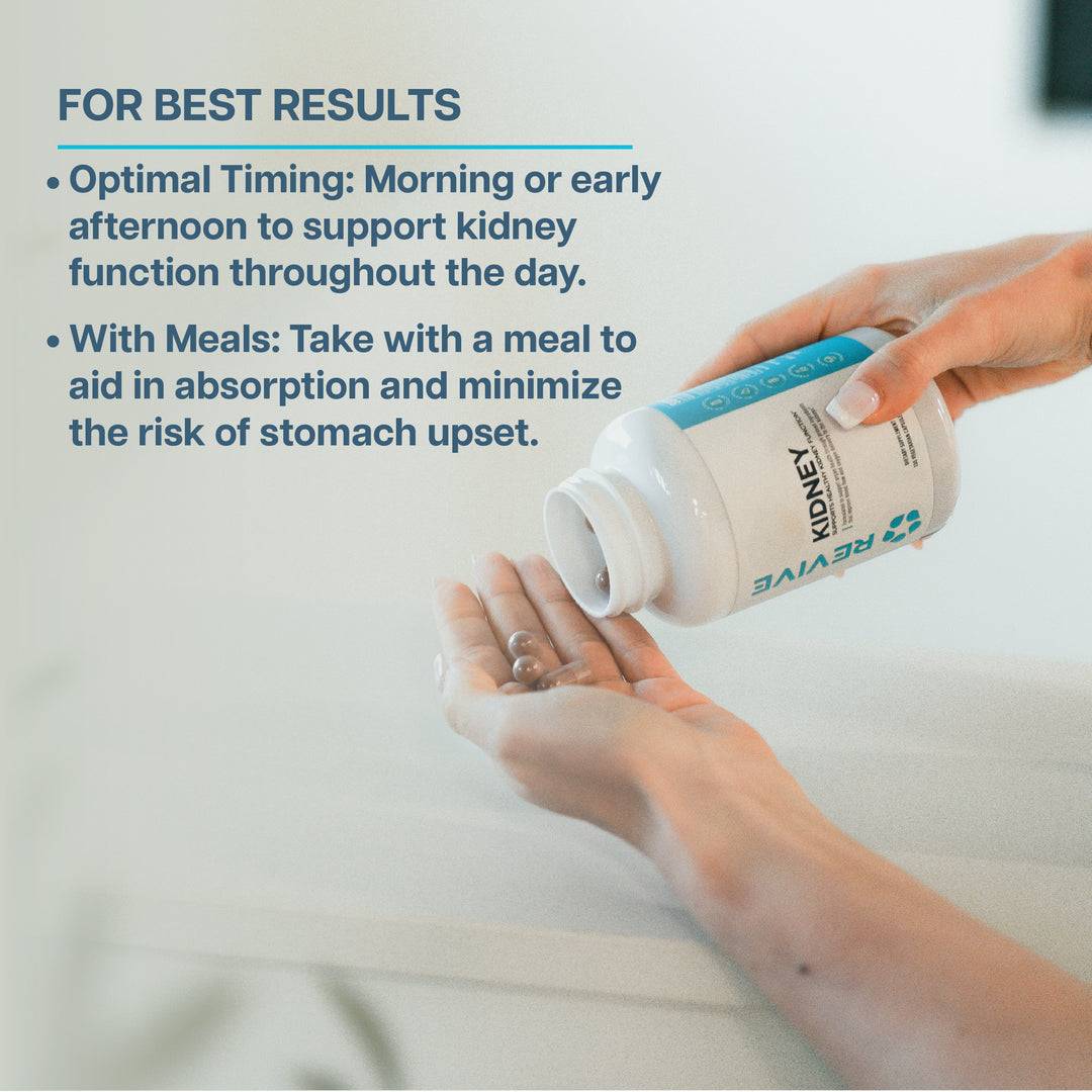 Hand pouring Revive Kidney capsules from bottle. Best taken with meals in the morning or early afternoon for enhanced kidney function support.