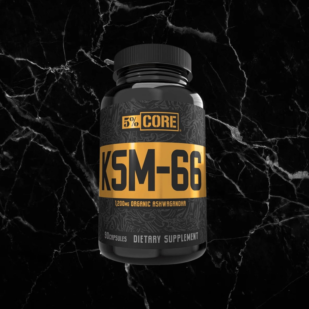 Rich Piana 5% Nutrition KSM-66 Ash supplement bottle with bold yellow label on black marble background. Features 1200mg organic ashwagandha per serving.
