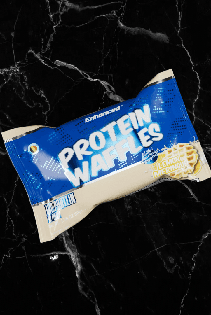 Enhanced Protein Waffles Lemon Meringue flavor in blue packaging, high protein snack with 11g protein per serving.