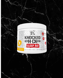 Rich Piana 5% Knocked The F*ck Out Sleep Aid in Honey Lemon Tea flavor, natural sleep support with GABA and melatonin, 30-serving essentials supplement.