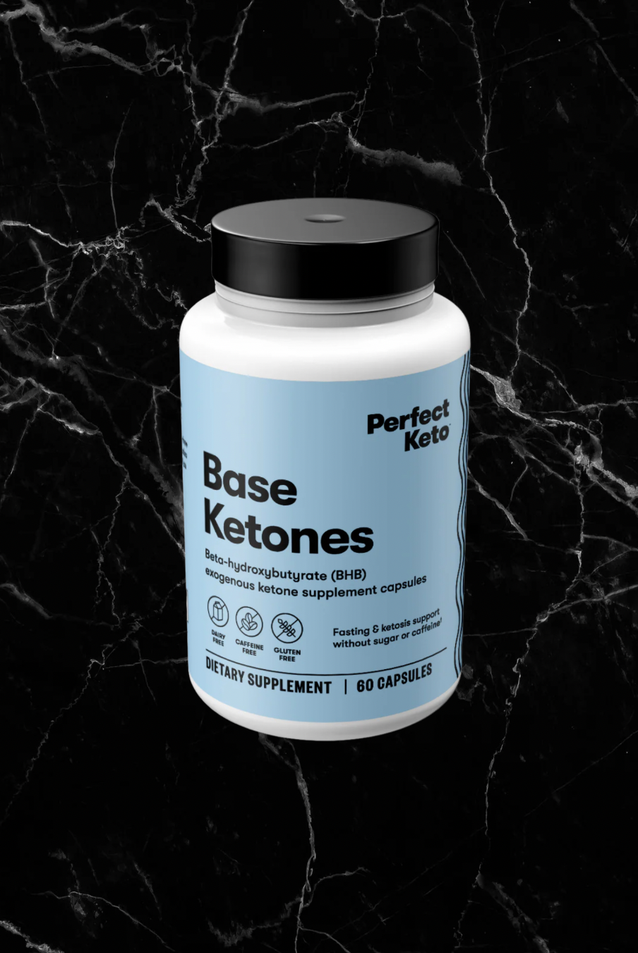 Perfect Keto Beta-Hydroxybutyrate (BHB) Exogenous Ketones Capsules on black marble background. Supports fasting, energy, and ketosis.