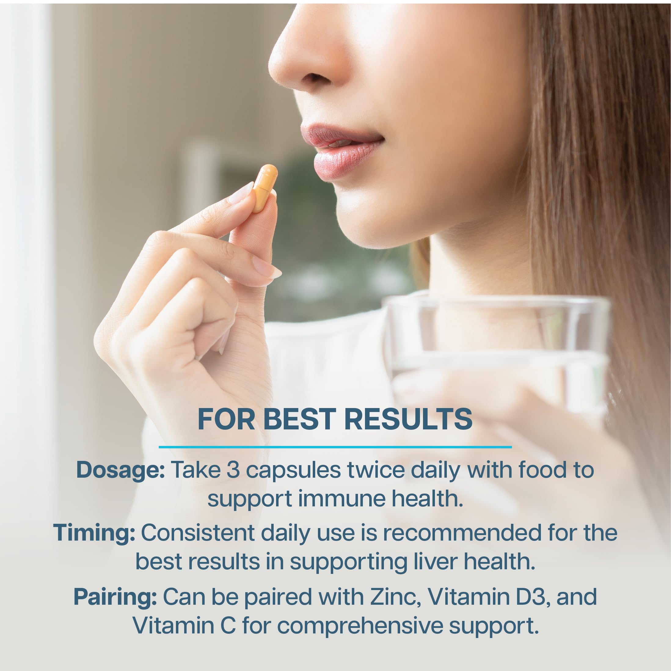 Woman taking REVIVE Immune Defense Booster capsule with water, showing dosage instructions and pairing suggestions for optimal immune support results.