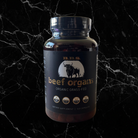 Grass-Fed Beef Organs supplement bottle with 120 capsules, featuring organic desiccated liver, heart, kidney, spleen, and pancreas blend.